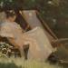 The artist's wife sitting in a garden chair at Skagen